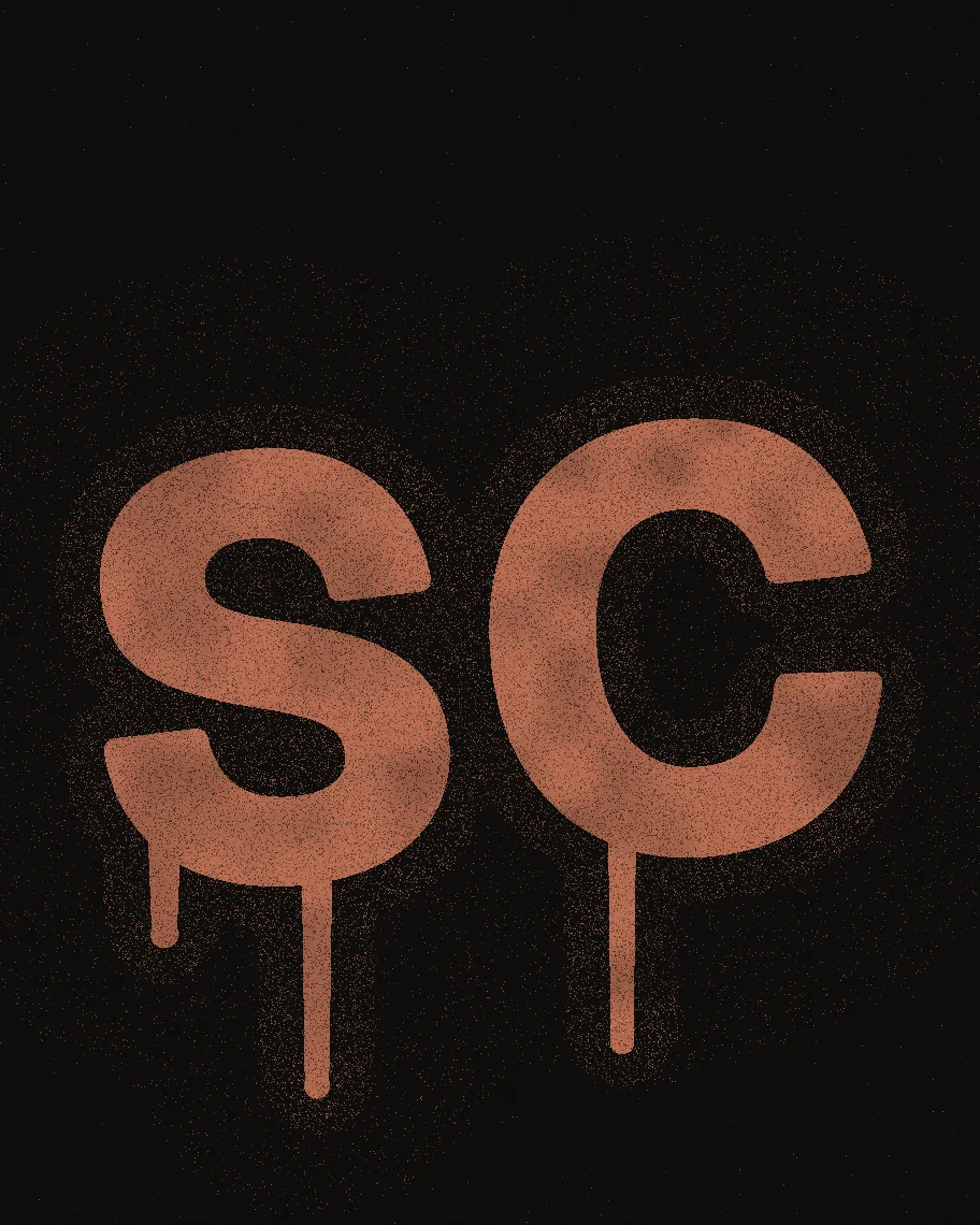 SC spray-painted in clay on black